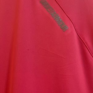 Women’s Under Armour 3/4 zipper long sleeved heat gear shirt. Size large.